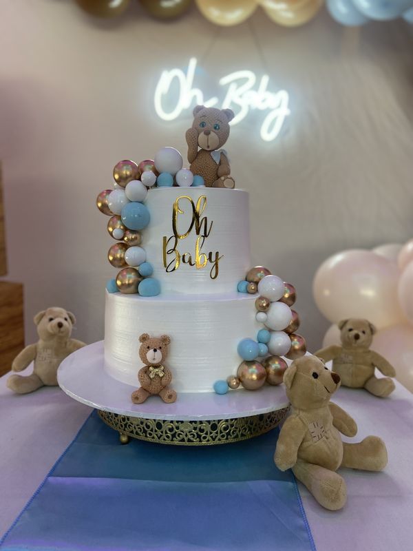 Two-tier Oh Baby cake with teddy bear toppers