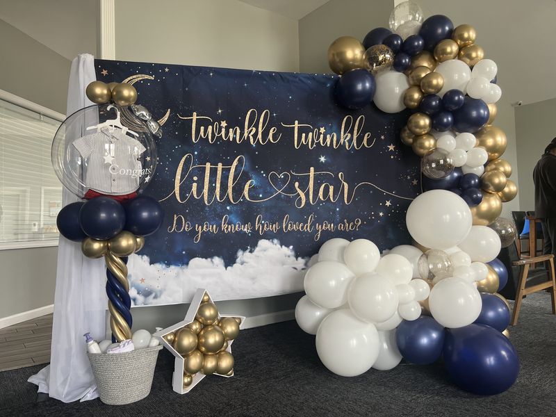 Twinkle Twinkle Little Star baby shower backdrop with navy and gold balloons